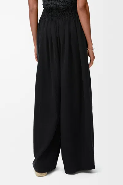 Loewe Trousers In Lyocell In Black