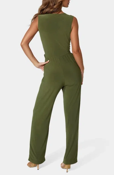 Bebe Sleeveless Faux Wrap Jumpsuit In Green