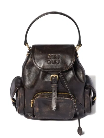 Miu Miu Buckle-fastening Medium Backpack In Brown