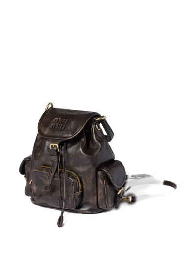 Miu Miu Buckle-fastening Medium Backpack In Brown