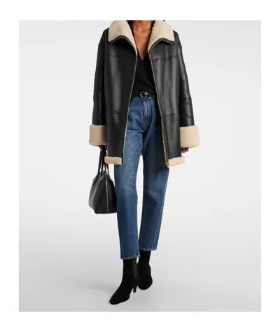 Totême Toteme Twisted Seam Slim Jeans In Blue