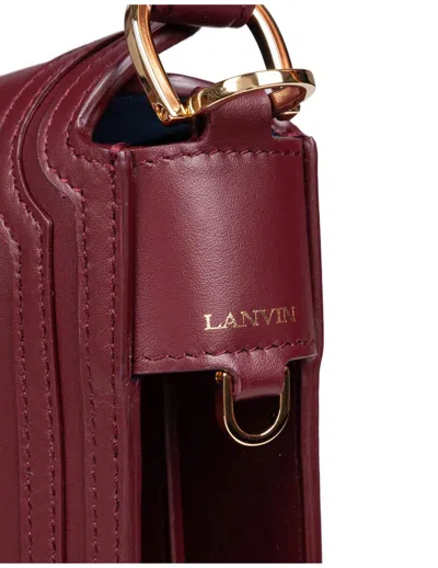 Lanvin Asymmetrical Compagnon Suede Bag In Burgundy
