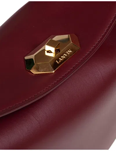 Lanvin Asymmetrical Compagnon Suede Bag In Burgundy