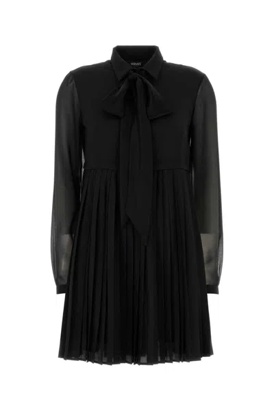 Versace Mini Dress With Pleated Skirt And Sheer Sleeves In Black