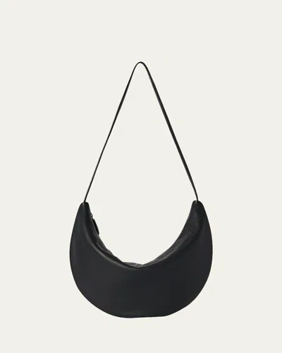 The Row Izzy Small Crescent Shoulder Bag In Leather In Black