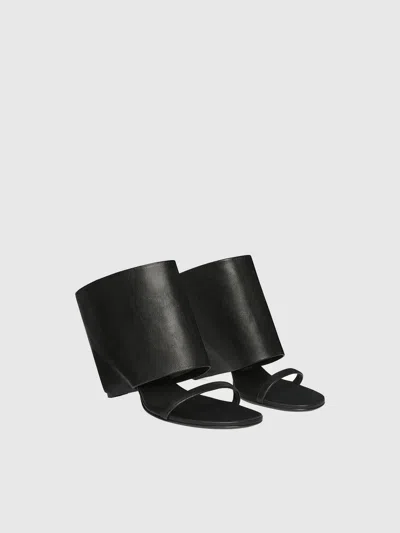 Courrèges Leather Wedge Mules In Black
