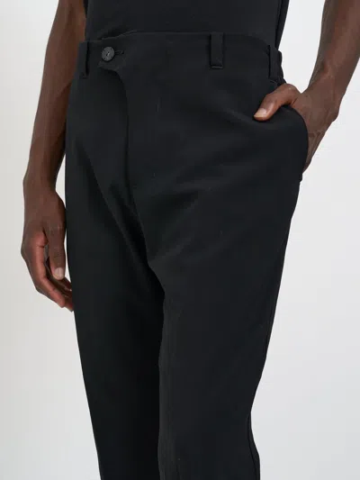 Devoa Wool Trousers With Pleats In Black