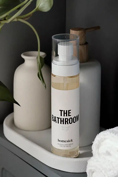 Homesick Linen & Room Spray In The Bathroom At Urban Outfitters In White