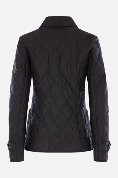 Burberry Coats In Black