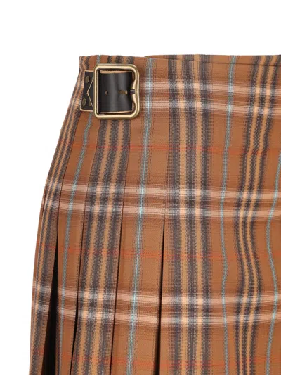 Burberry Pleated Skirt With Frayed Hem And Buckles In Brown