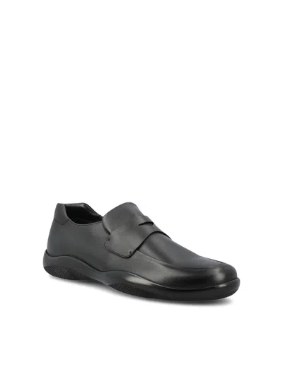 Prada Toblach Leather Penny Loafers In Black