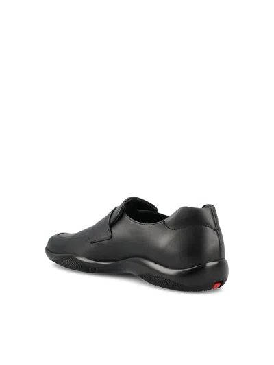 Prada Toblach Leather Penny Loafers In Black
