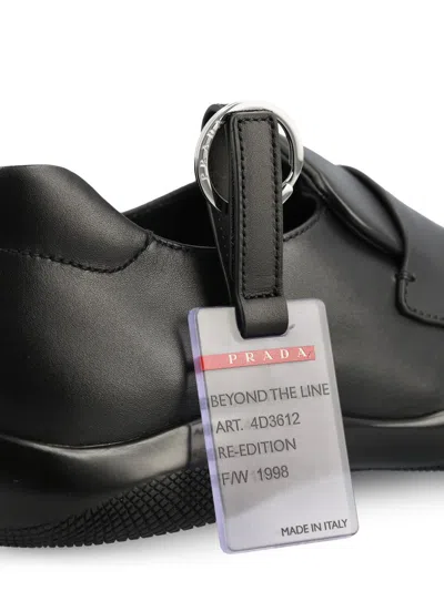 Prada Toblach Leather Penny Loafers In Black