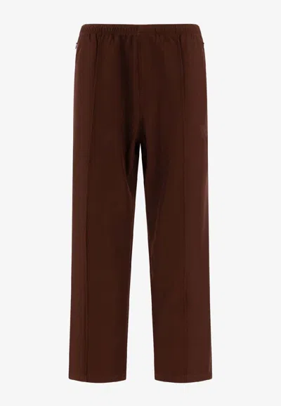 Needles Logo Embroidered Mid Rise Trousers In Red