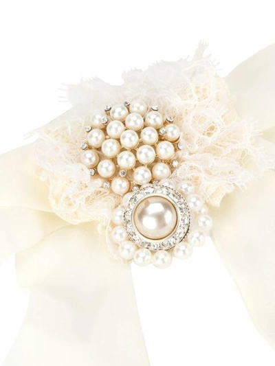 bow embellished brooch