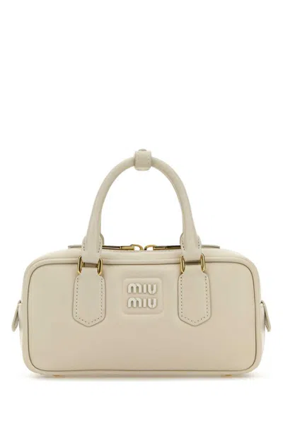 Miu Miu Handbags. In White