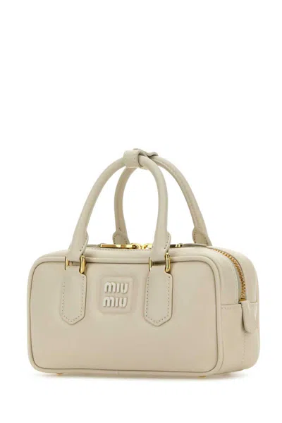 Miu Miu Handbags. In White