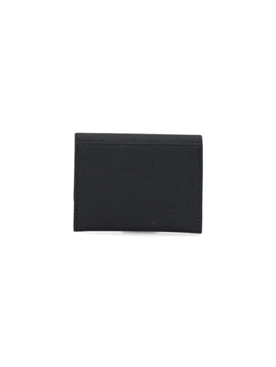 Ferragamo Gancini Tri-fold Leather Wallet In Black