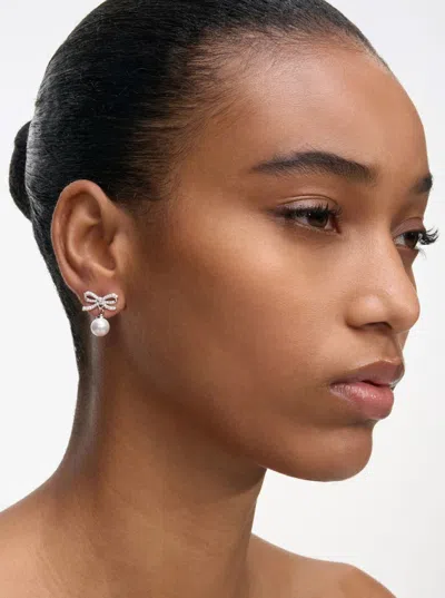 Self-portrait Earrings With Bow And Pearls In Metallic