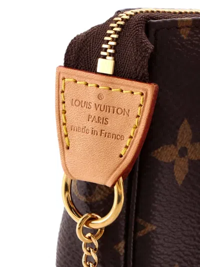 Pre-owned Louis Vuitton Pochette Accessoires Monogram Canvas Mini Clutch Bag In Brown