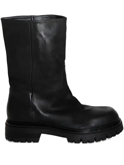 Chuckies Lug-sole Boots In Black