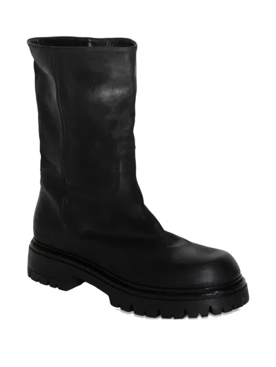 Chuckies Lug-sole Boots In Black