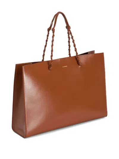 Jil Sander Tangle Knotted Handle Embossed Tote Bag In Brown