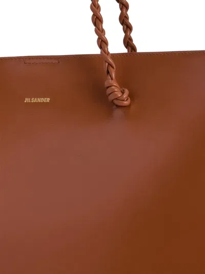 Jil Sander Tangle Knotted Handle Embossed Tote Bag In Brown