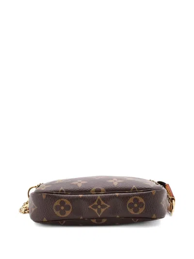 Pre-owned Louis Vuitton Pochette Accessoires Monogram Canvas Mini Clutch Bag In Brown