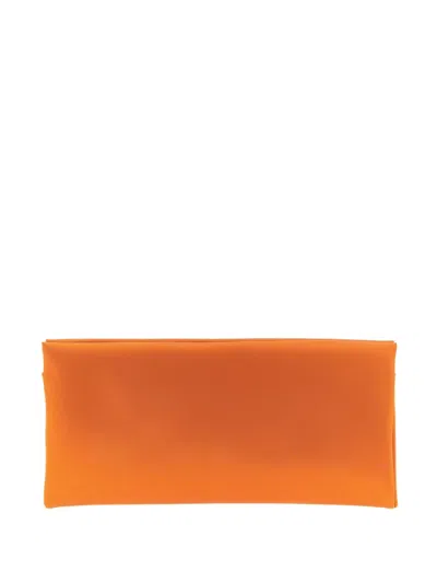 Saint Laurent Medium Cassandre-charm Clutch Bag In Orange
