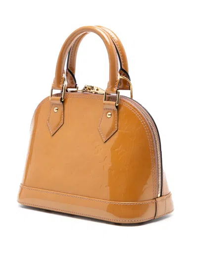 Pre-owned Louis Vuitton 2013 Monogram Vernis Alma Bb Satchel In Brown