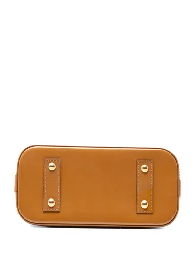 Pre-owned Louis Vuitton 2013 Monogram Vernis Alma Bb Satchel In Brown