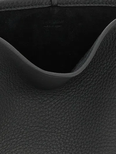 The Row Drawstring-fastening Crossbody Bag In Purple