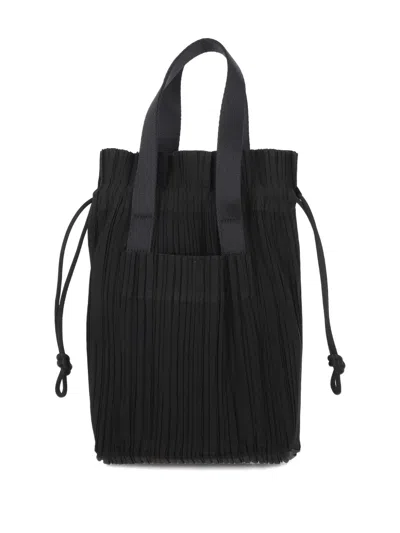 Issey Miyake Pleated Drawstring Tote Bag In Burgundy