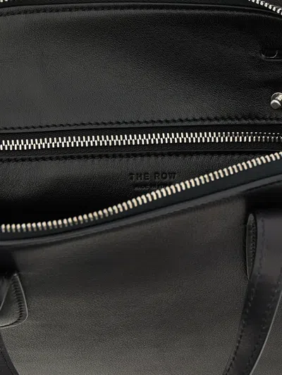 The Row Ingrid Embossed-logo Medium Tote Bag In Black