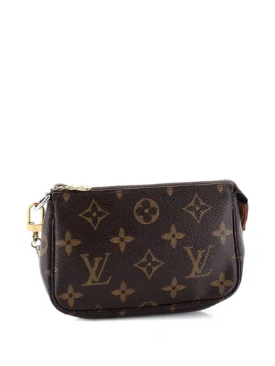 Pre-owned Louis Vuitton Pochette Accessoires Monogram Canvas Mini Clutch Bag In Brown