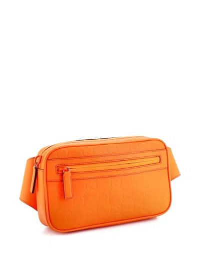 Pre-owned Gucci Front Zip Gg Rubber Effect Leather Belt Bag In Orange