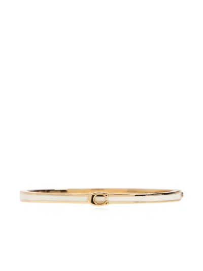 Coach Logo Bangle Bracelet In Gold