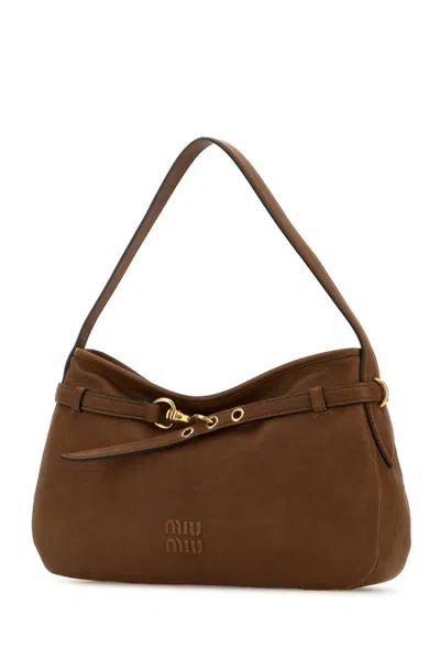 Miu Miu Handbags. In Brown