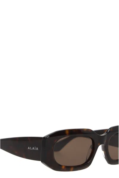 Alaïa Rectangular Sunglasses In Brown