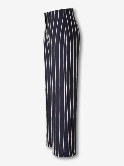 Andres Otalora Striped-pattern Trousers In Blue