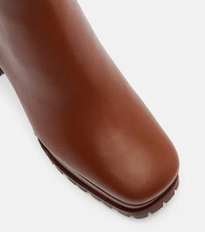 70羊毛皮衬里皮革防水台及踝靴