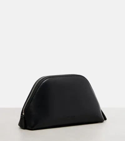The Row Devon Mini Leather Clutch In Black