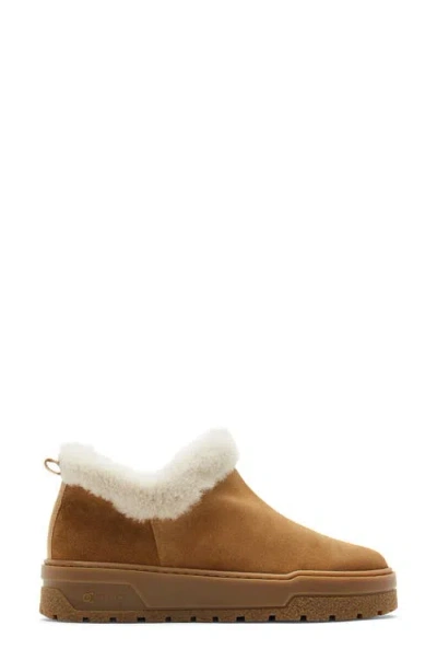La Canadienne Lugano Genuine Shearling Lined Slip On Boot In Brown
