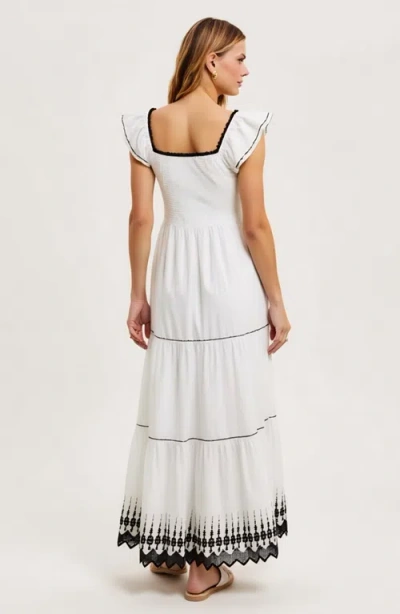 Modenaire Smocked Bodice Tiered Flutter Sleeve Embroidered Hem Maxi Dress In White