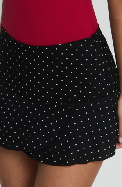 Princess Polly Sonsie Polka Dot Crossover Hem Miniskirt In Black