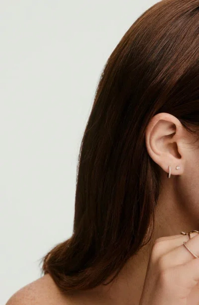 Mejuri Pave Diamond Huggie Hoops In Yellow