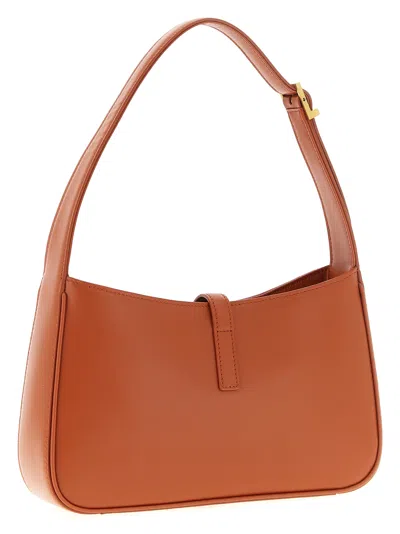 Saint Laurent Le 5 A 7 Ysl Shoulder Bag In Patent Leather In Orange