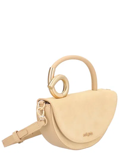 Cult Gaia Azariah Coil Leather Top-handle Bag In Yellow