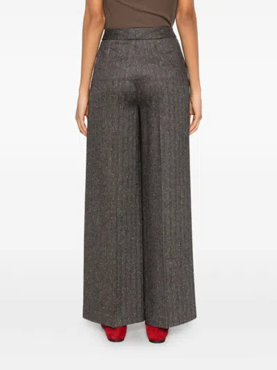 Via Masini 80 Wool Blend Trousers In Brown